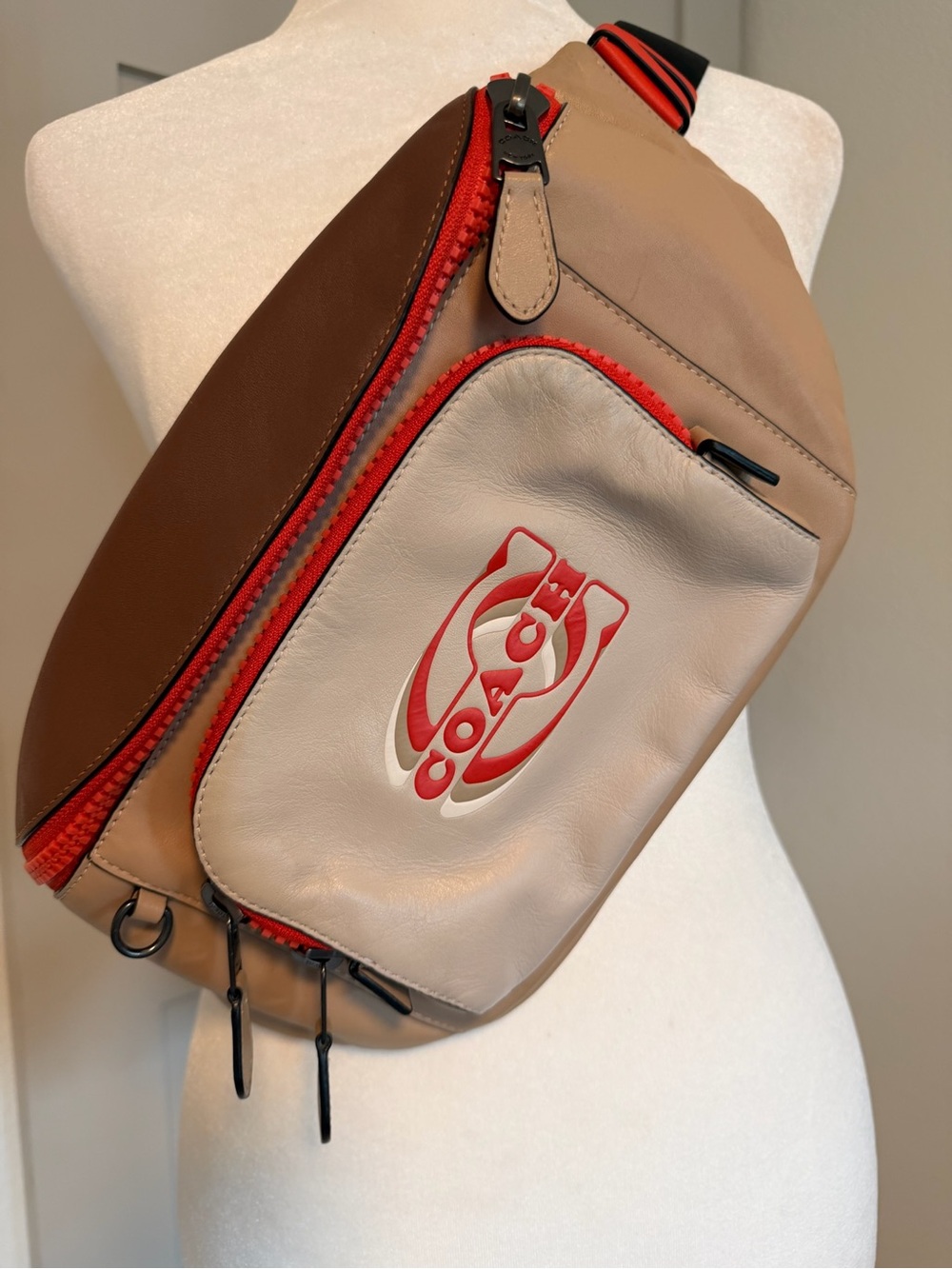 Coach Track Belt Bag in a beige and brown colorblock